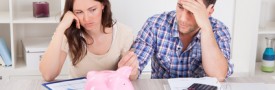 Couple Expecting Money From Piggybank